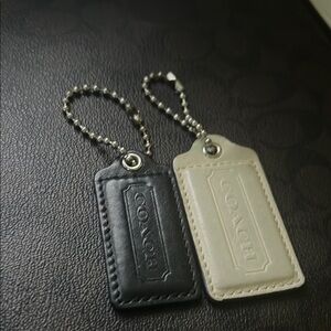 Coach Black and Cream Leather Tags